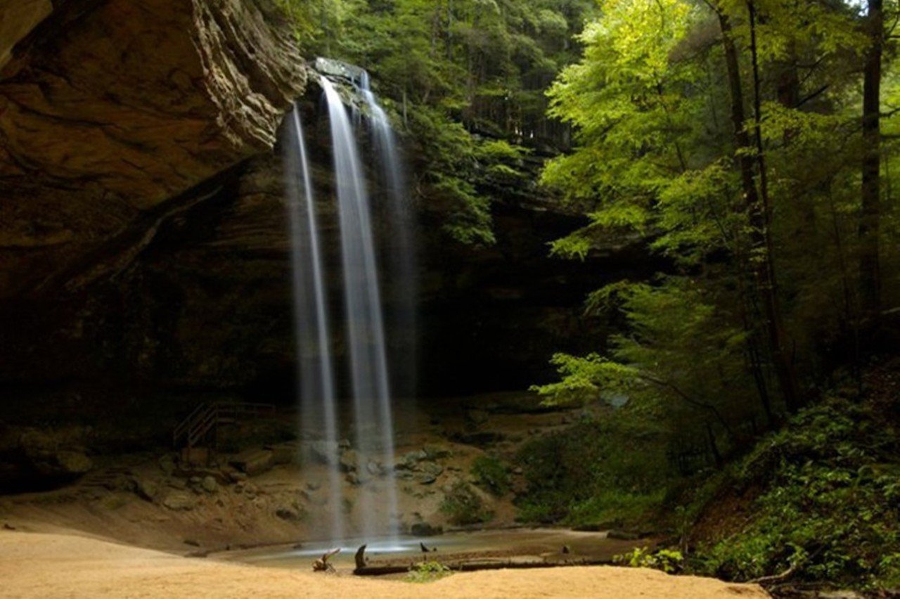 Hocking Hills State Park
Hocking Hills State Park has five different sections within the 9,000+ acres of land to explore. Millions of guests embrace the forest year-round by hiking, rock climbing, canoeing and camping on one of the 200 campsites in the area. A must-see is Ash Cave, an out-of-this-world rock formation that just so happens to be the biggest recess cave in the state.