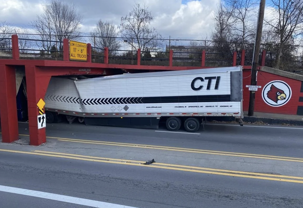 All the signs and warning lights couldn't stop this trucker, but the Can Opener sure did.