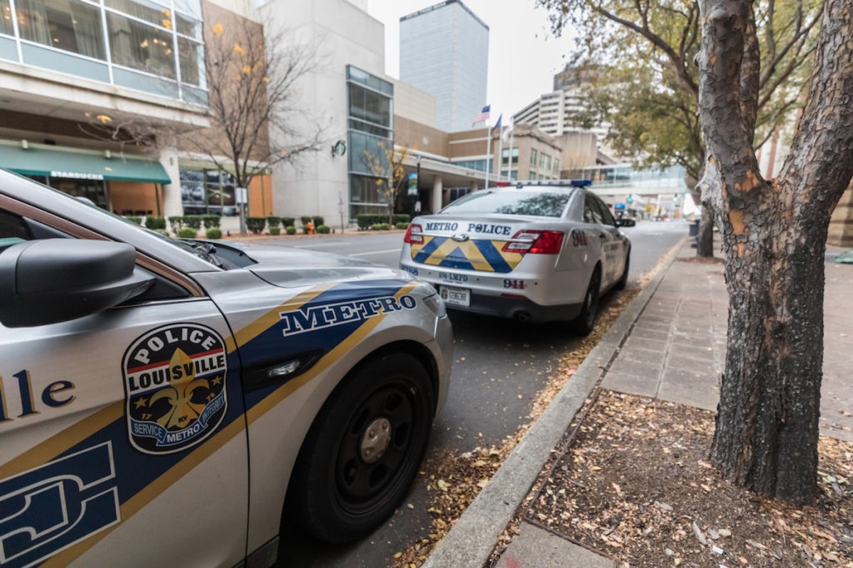 Louisville Police Officer Who Threw Beverages