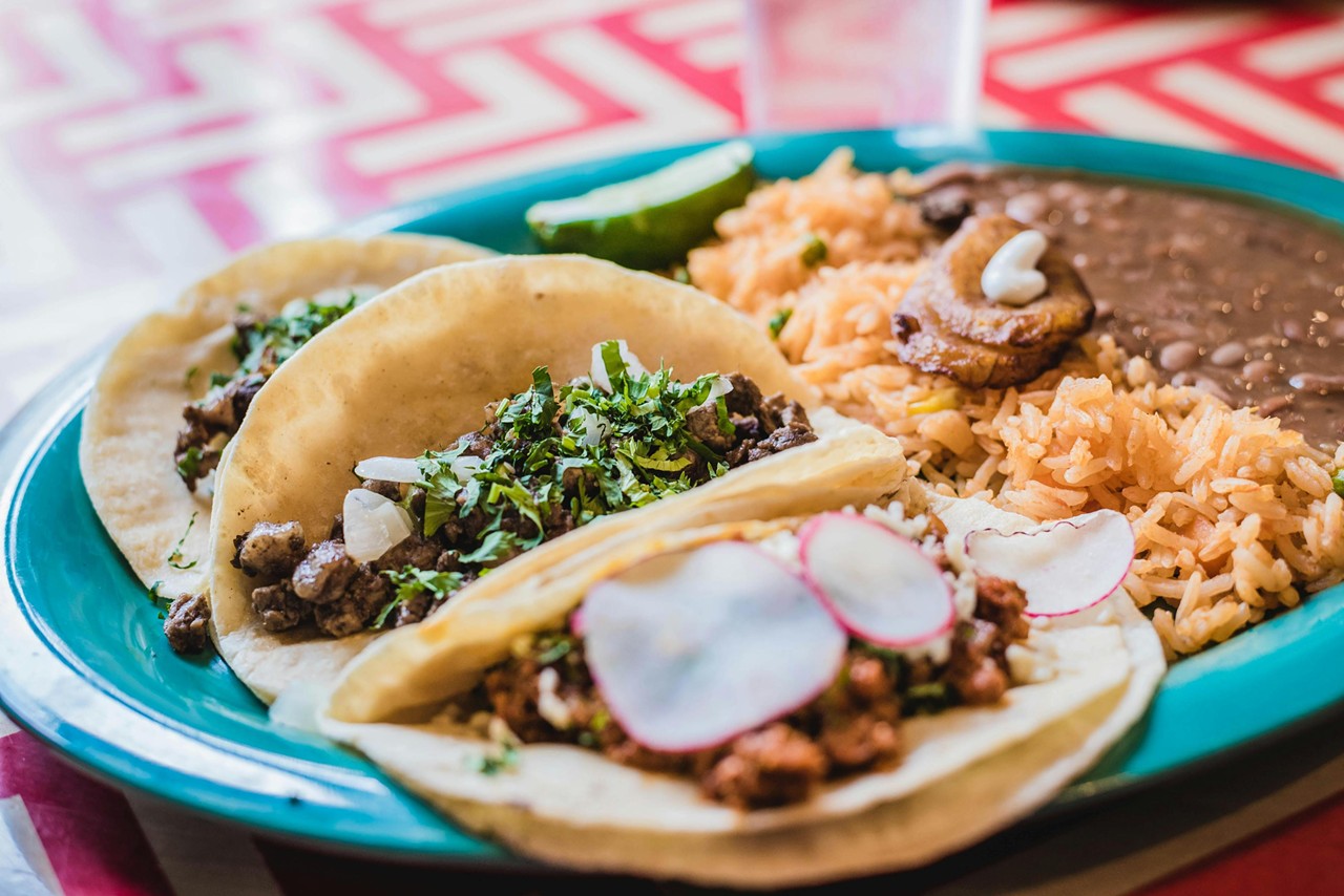 Lengua Taco at Supermarket at Preston Highway
6201 Preston Hwy. Suite B
Supermercado Guanajuato #2 is a rare taco joint tucked into a Mexican supermarket where you can buy fresh made chorizo, pig ears, Jesus candles and enough chicharrons to last you to armageddon. I thought long and hard about whether or not to add this place to the list because it’s been my secret taco joint for years. When I just want to be left alone, I know I can lose myself in a plateful of lengua tacos (that’s tongue for the uninitiated) that are dripping with sauce and trembling with fat and barely holding onto the cilantro and chopped onions that will surely fall into your lap by your second bite.