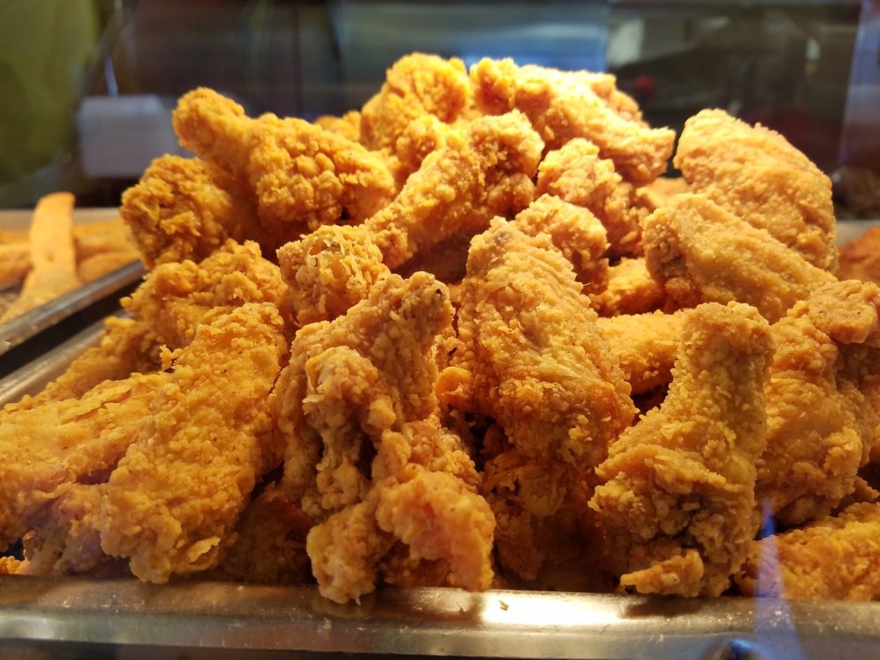 Dark Meat Fried Chicken & Hot Sauce at Indi’s on W. Broadway
1033 W Broadway
I’ve been eating here for over 20 years and every year, I swear I’m going to find a new fried chicken spot to get me out of my predictable habit of a late afternoon snack of fried chicken drumsticks, boiled greens and homemade hot sauce. But let’s face it, Indi’s is still the best in the ‘Ville. And despite the other locations that Indi’s has around the city, it’s only this specific location that does it for me!