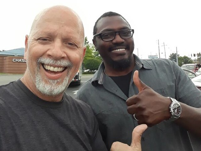 The cover photo of "R&eacute;cits Francophones au C&#156;ur de l'Am&eacute;rique, with Jim Natsis, left, and Patrick Litanga, right.