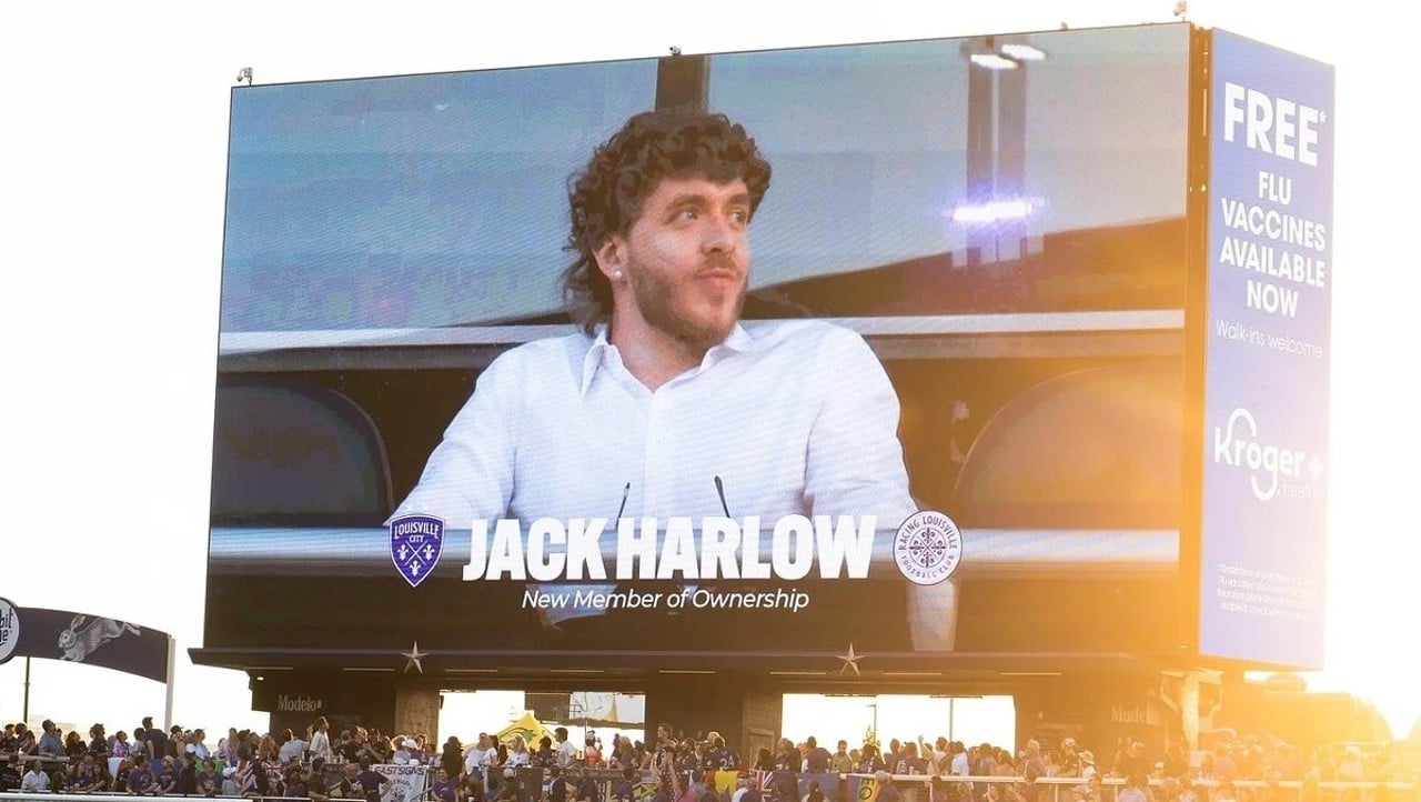 1. Jack Harlow Joins Ownership Group For Two Of Louisville’s Premier Soccer Clubs Jack Harlow made a surprise appearance at Lynn Family Stadium on Sunday, August 18, to be announced as one of the newest owners of both Louisville City FC and Racing Louisville, which are the city’s men’s and women’s professional soccer teams in the United Soccer League (USL)
Harlow has always been a fan of soccer growing up, and his involvement with Soccer Holdings, the ownership group behind both teams, solidifies his spot among some of the most intense fans in the city.