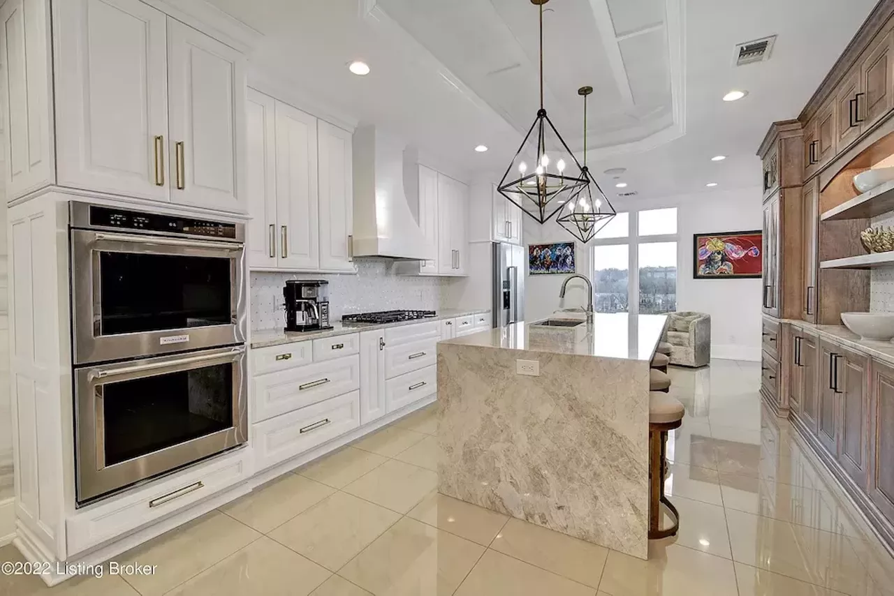 Curated visual reference: Fresh Look at This Louisville Riverfront Penthouse Has A Spiral Staircase And