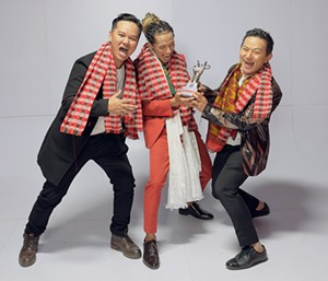 "The Voice of Nepal" Season 4 winner Karan Rai (center) with his coach (right).