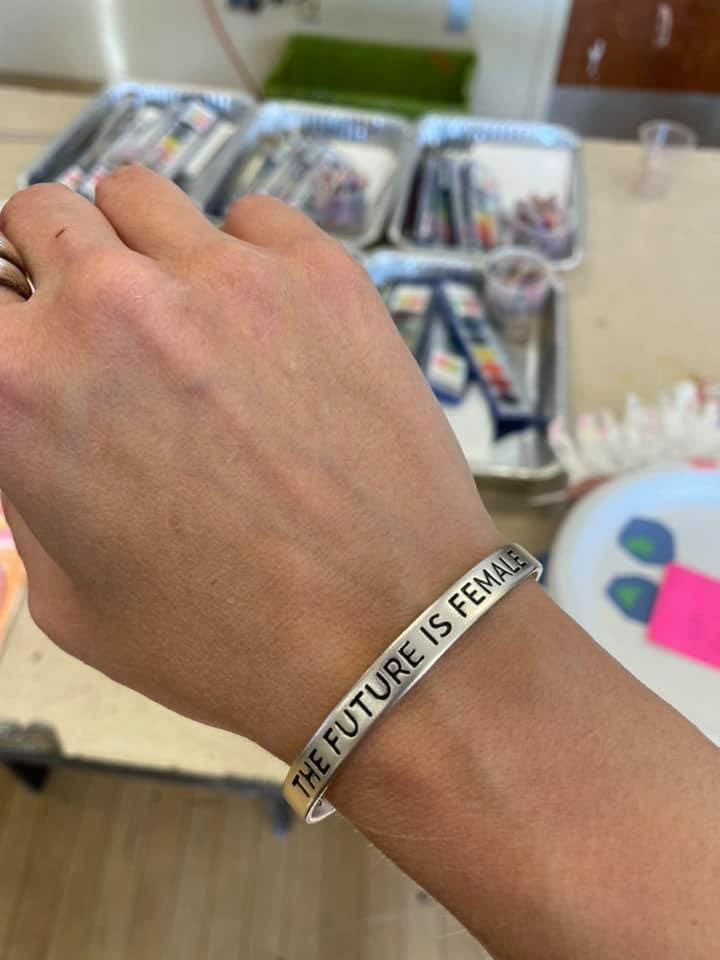 A supporter cheers Vice President Kamala Harris' breaking the glass ceiling.