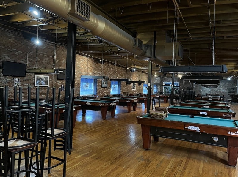 Pool tables in the former Diamond Pub & Billiards building.