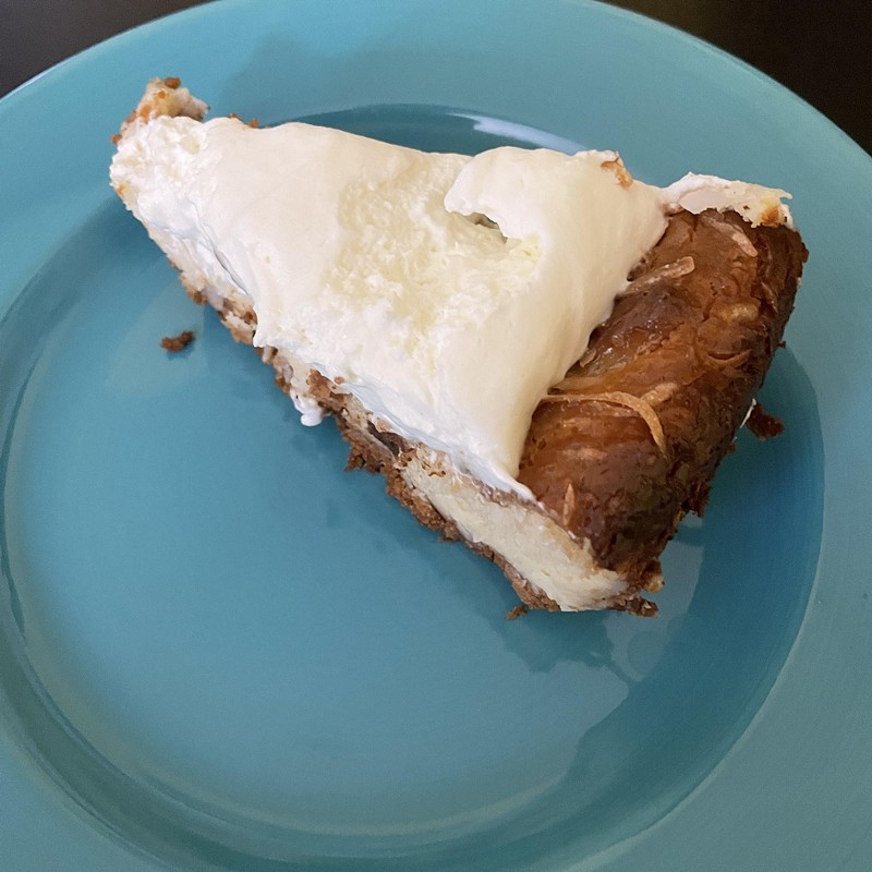 Dessert? Don't mind if I do! Don't count the calories in this generous slice of creamy, rich coconut pie at Starving Artist Cafe, complete with a dollop of whipped cream on top. - Robin Garr