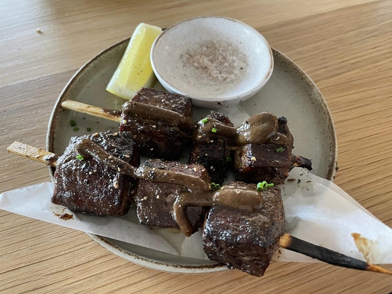 Skewered and charcoal-grilled, six hefty cubes of quality local beef touched with mushroom and butter flavors were remarkably good. - Robin Garr