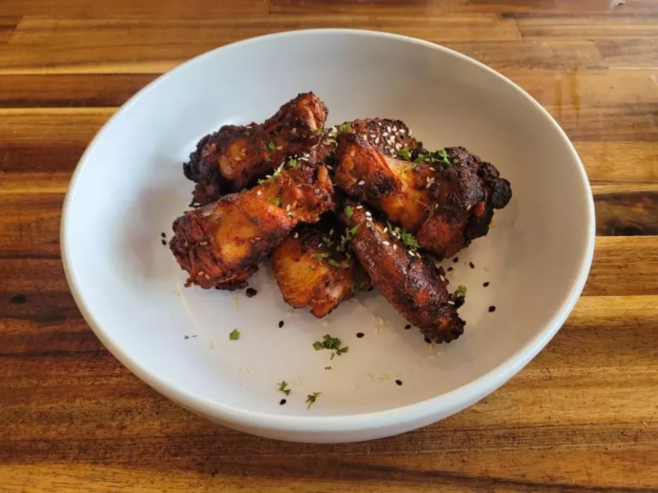 Hop Atomica
Rocket Wings
Hickory smoked, dry-rubbed, & tossed in house-made, hot honey infused, "Rocket Sauce", with a chervil & toasted sesame seed garnish.