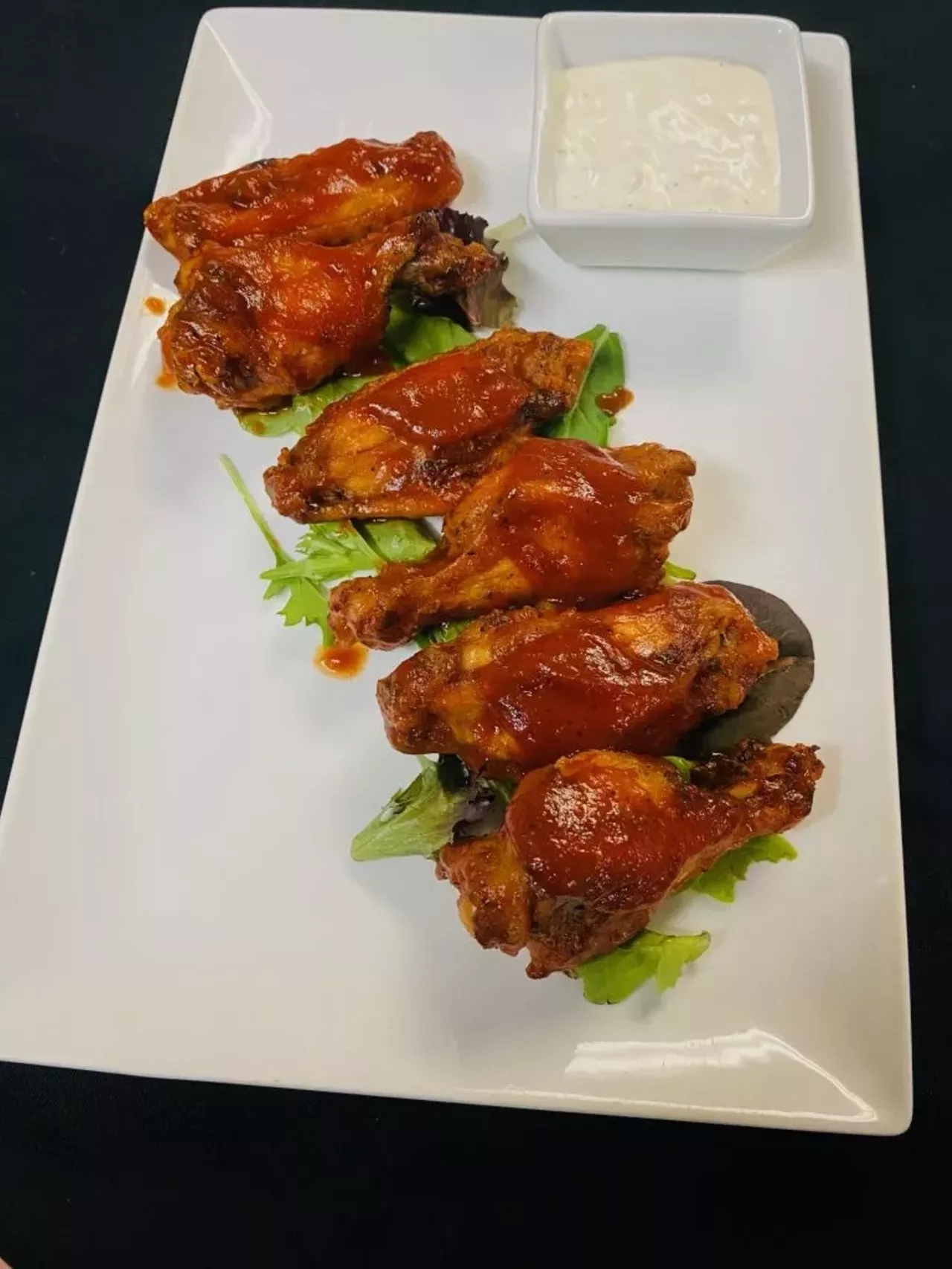 La Suerte
6 wings with your choice of: classic buffalo, chipotle, mango habanero, sesame ginger jalapeño, La Diabla, and house smoked bbq.